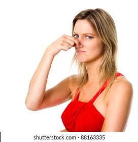 Woman Pinches Her Nose To Block A Bad Smell