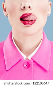 Woman In Pink Jacket Licking Her Lips, Cloe-up Shot