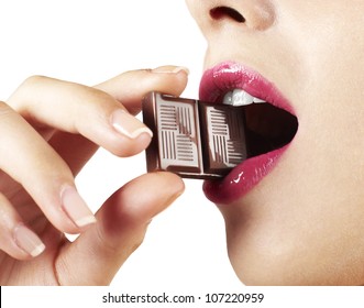 Woman With Pink Lips Biting Chocolate Bar Detail