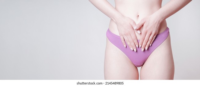 Woman In Pink Panties Hands Touching Belly As Women's Health Concept In Web Banner Format With Copy Space