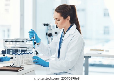 Woman, pipette and scientist with medical research, chemistry laboratory and science for pharmaceutical in Denmark. Female person, petri dish and sample in pathology, test or analysis in mpox vaccine - Powered by Shutterstock