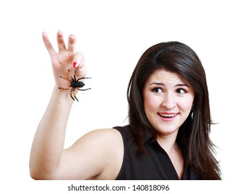 Woman With A Plastic Spider Acting Scared