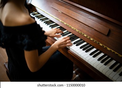 Woman to play the piano