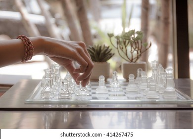 Woman Playing A Chess Game