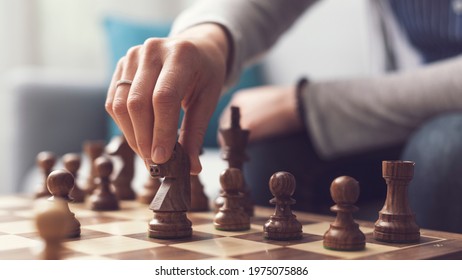 Woman Playing Chess, She Is Moving A Piece, Hand Close Up