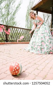 Woman Playing Croquet