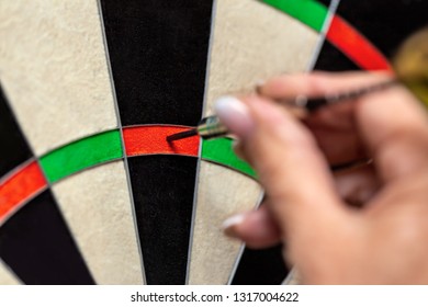 Woman Playing Dart, Professional Steeldart Sport, Closeup Dartboard And Dart Point