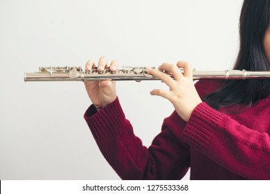 Woman Playing Flute