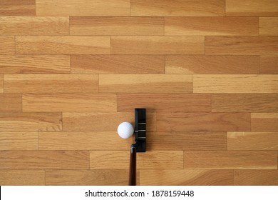 Woman Playing Mini Golf At Home