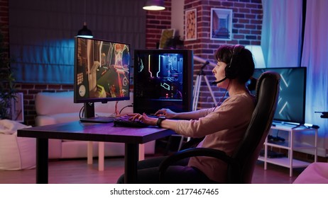 Woman Playing Online Action Game Angry After Losing Online Competition On Gaming Pc At Home. Gamer Girl Unhappy And Disappointed After Failing Level In First Person Shooter Tournament Challenge.