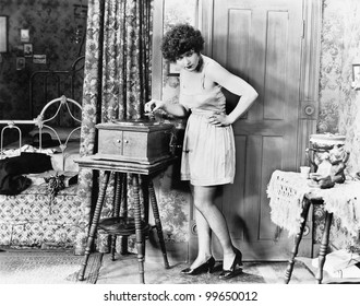 Woman playing record player
