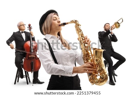 Woman playing a sax and two men in the back playing a trombone and a cello isolated on white background