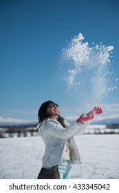 Woman Plays Snow In Hokkaido Ski Area