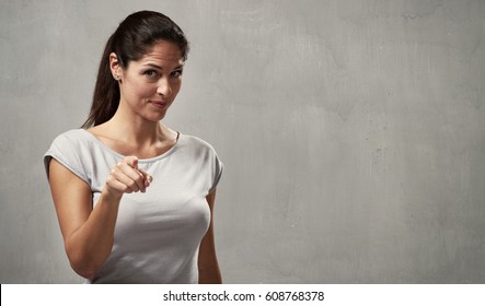 Woman Pointing To The Camera