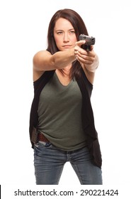 Woman Pointing A Gun With A Straight Trigger Finger| Attractive Female Shooter Holding Handgun Against White Background.