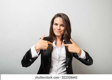 woman pointing at herself