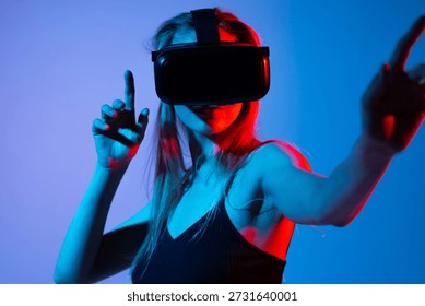 Woman pointing at virtual interface while wearing VR headset, immersive gesture control and futuristic technology
