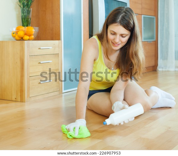 Woman Polishing Parquet Furniture Polish Home Stock Image