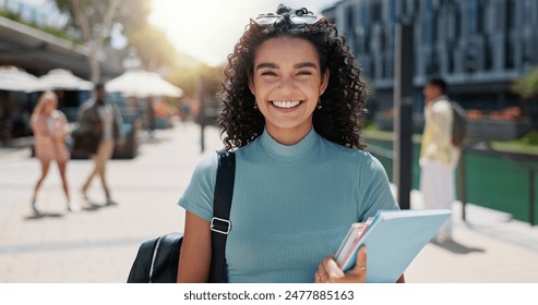 Woman, portrait and outdoor happiness at university, books for education or learning on campus. Female student, smile and notes for knowledge at college, academy scholarship for school in Canada