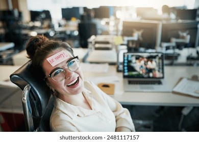 Woman, portrait and paper on forehead in office with happy reminder, work break and comedy prank by desk. Business worker, girl smile and sticky note on face with workplace humor, fun and April Fools - Powered by Shutterstock