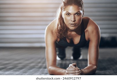 Woman, portrait and plank exercise for athlete training or gym fitness as health, confidence or workout. Female person. arms and face for abs challenge or strong balance for muscle, sport or wellness - Powered by Shutterstock