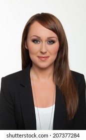 Woman Poses For A Passport Photo