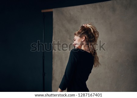 Woman posing on camera for photos