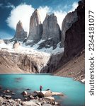 A woman posing on the ice formation of the Torres del Paine, Chile