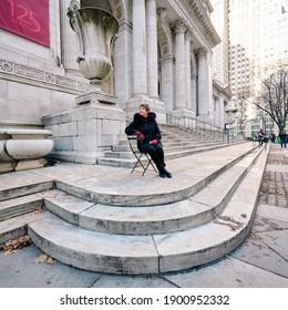 A Woman Is Posing At The Steps Of New York Public Library - Stephen A. Schwarzman Building