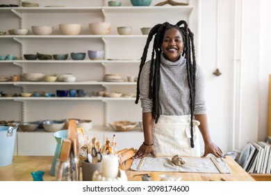 Woman pottery artist working in her art studio
 - Powered by Shutterstock