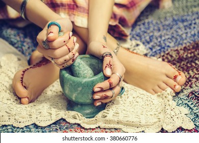 Woman With Pounder And Pestle In Her Hands Prepare Some Potion 