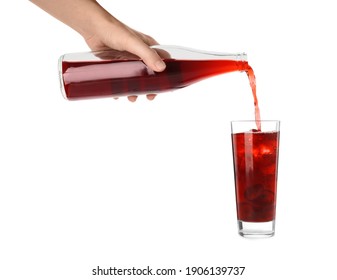 Woman Pouring Grape Soda Water Into Glass On White Background, Closeup. Refreshing Drink