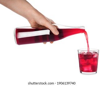 Woman Pouring Grape Soda Water Into Glass On White Background, Closeup. Refreshing Drink