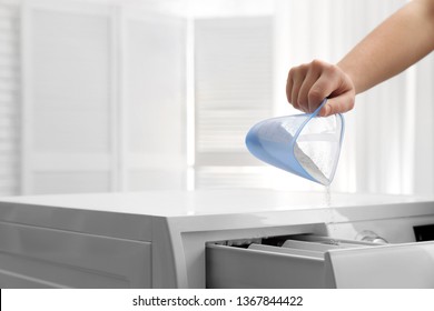 Woman pouring powder into drawer of washing machine indoors, closeup with space for text. Laundry day - Shutterstock ID 1367844422