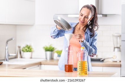 Woman Pouring Used Cooking Oil For Recycling And Reuse Into The Plastic Bottle To Be Made In The Factory Into The Fuel Additive. 