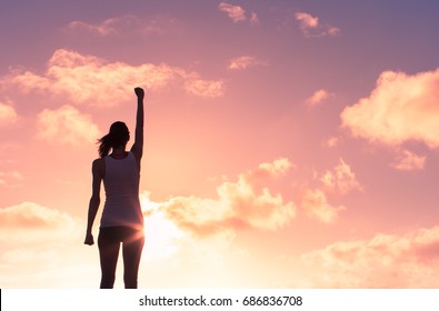 Woman, power, and victory concept.  - Shutterstock ID 686836708