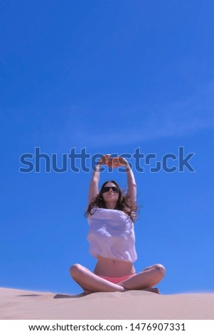 Similar – Image, Stock Photo Tattooed woman in front of a painted wall