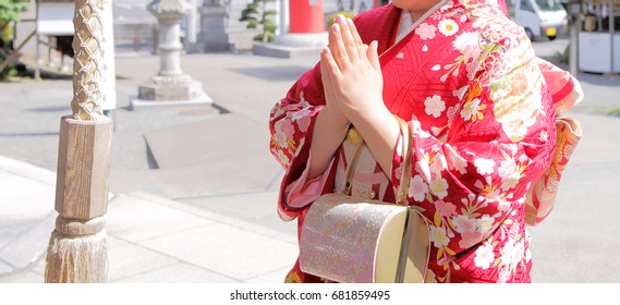 Woman To Pray In The Kimono To The Shrine/Kimono Is A Traditional Japanese Clothing