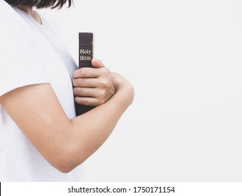 Woman prayer on bible, worship and religion. concept for faith, old Bible. copy space
 - Shutterstock ID 1750171154