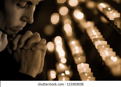 Woman Praying In Church