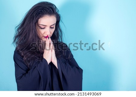 woman Praying hands with faith in religion and belief in God