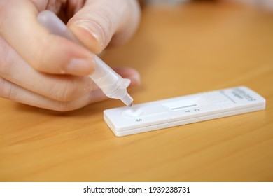 Woman preparing antigen self test or quick test for Corona or Covid-19