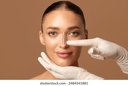 Woman preparing for plastic surgery, rhinoplasty operation, doctor examining lady nose, beige background, closeup