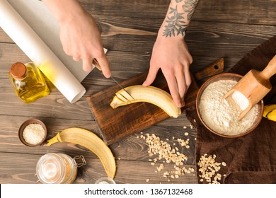 Woman Preparing Tasty Banana Bread At Table