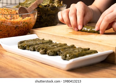 Woman Preparing Turkish Sarma ın The Wooden Table.