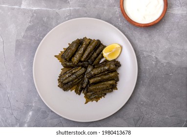 Woman Preparing Turkish Sarma ın The Wooden Table.