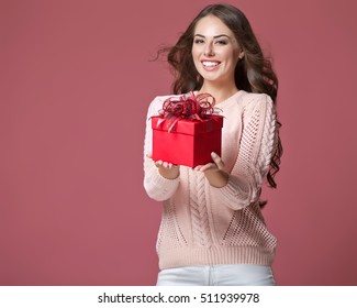 Woman With A Present. Happy Girl With A Gift.