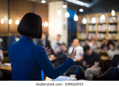 Woman Presenting to Audience. Business Presentation Conference Meeting
