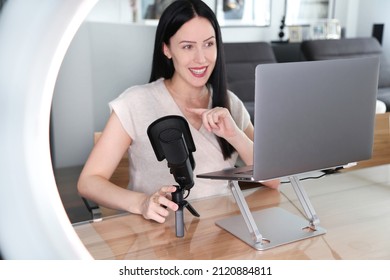 Woman Presenting In A Virtual Meeting In Home Office