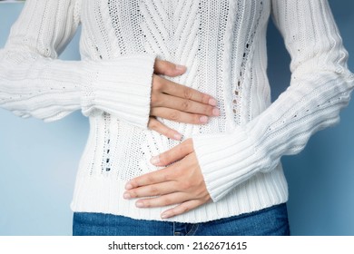 Woman Pressing Her Stomach In Pain, Woman With Irritable Bowel Syndrome, Indigestion, Constipation, (IBS), Health Care Concept